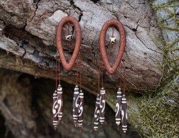 Natural handcrafted wood earring entitled Ezra