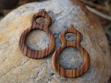 Tatiana's native style wooden dangle earring entitled Shades of Mother